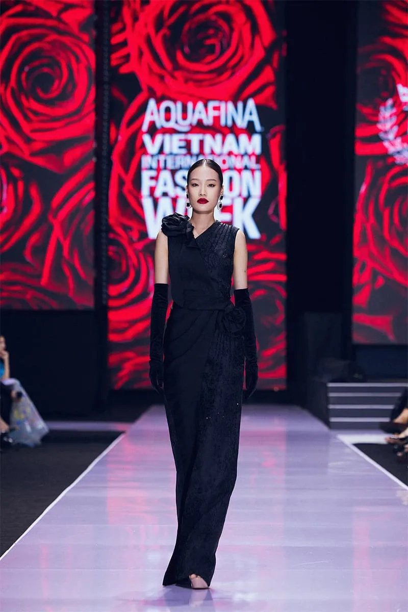 BLACK JACQUARD GOWN WITH DRAPED SATIN ROSES